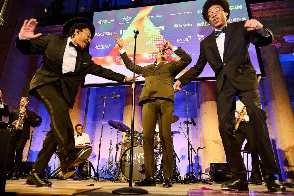 GLOWmusic LIVE performers on stage at a premium corporate gala